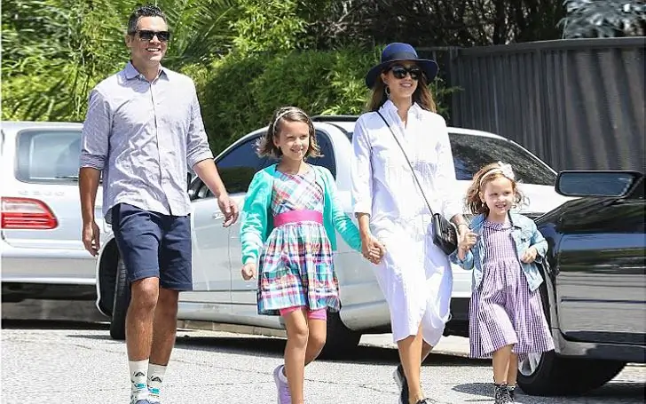 Alba with her husband and daughters